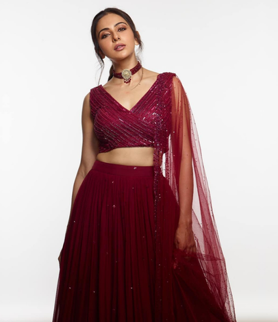 Celebrity styling — deep red lehenga, Megha & Jigar