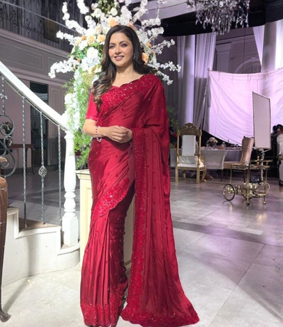 Celebrity styling — red draped saree, Megha & Jigar